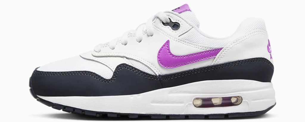 white, black, and purple nike sneaker