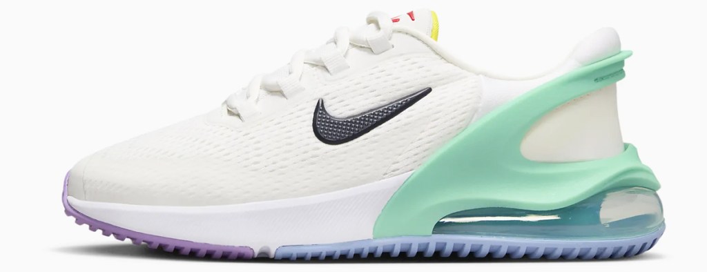 white nike sneaker with light green heel