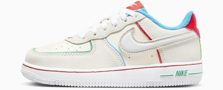 white nike sneaker with blue, red, and green accents