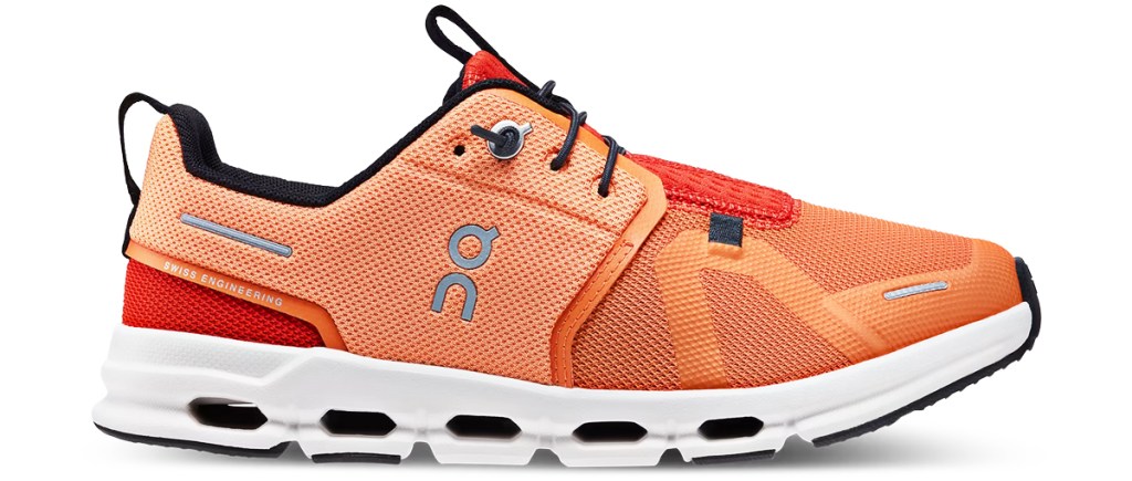 orange running shoe with white sole