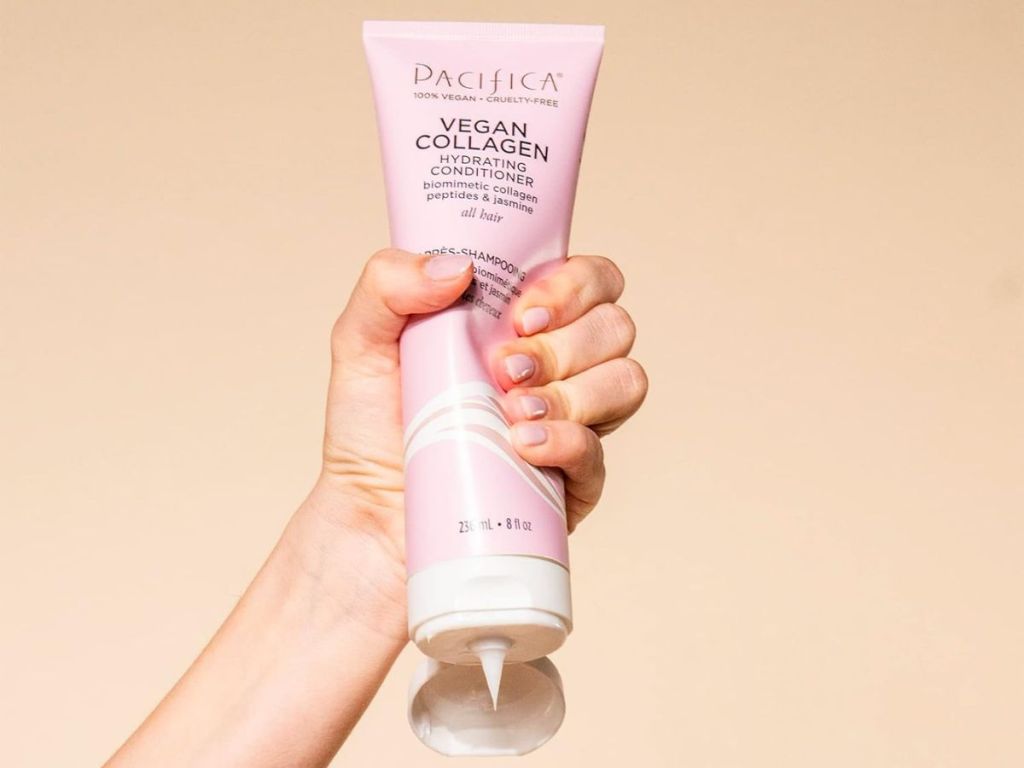 hand squeezing Pacifica Beauty Vegan Collagen Hydrating Conditioner