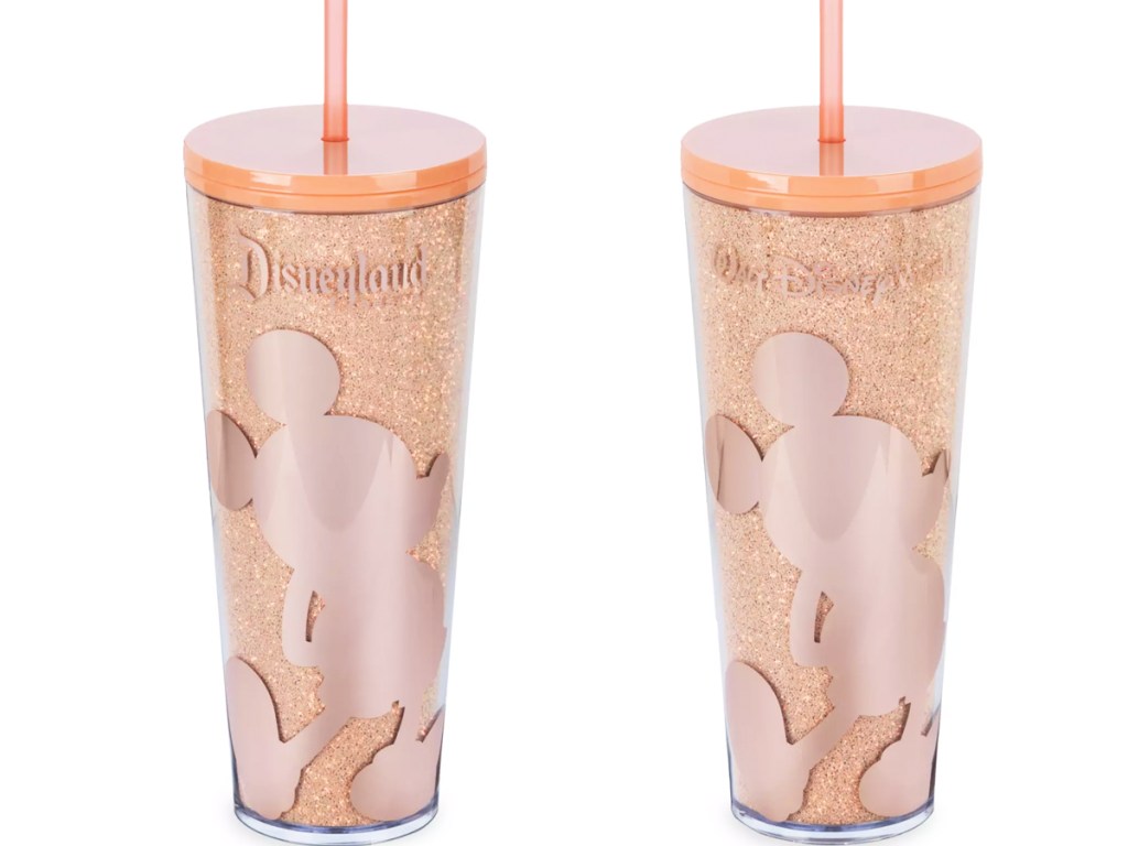two sparkly peach mickey mouse starbucks tumblers