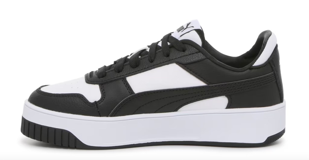 Stock photo of black and white puma sneakers
