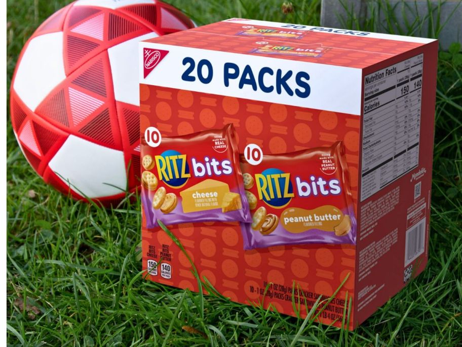 hand holding RITZ-Bits-Cheese-RITZ-Bits-Peanut-Butter-Sandwich-Crackers-Variety-Pack-20-Count 