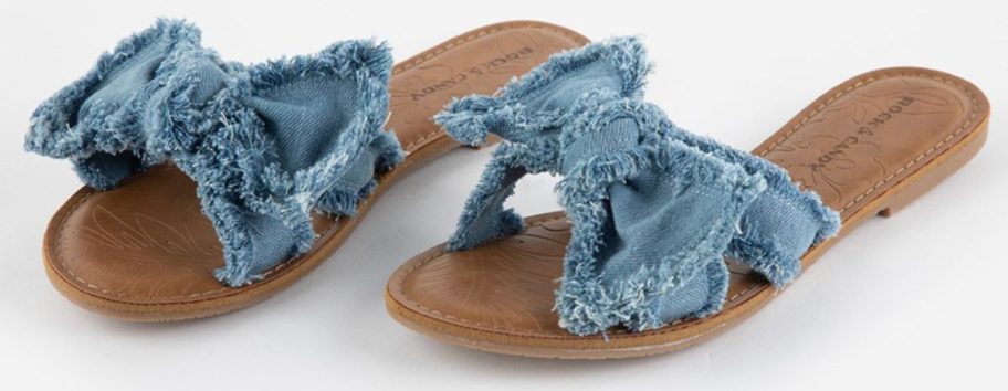 a pair of denim colored womens sandals