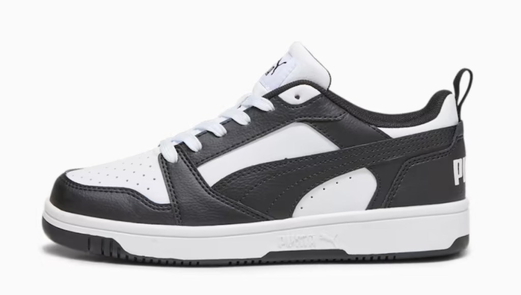 stock photo of white and black puma sneaker