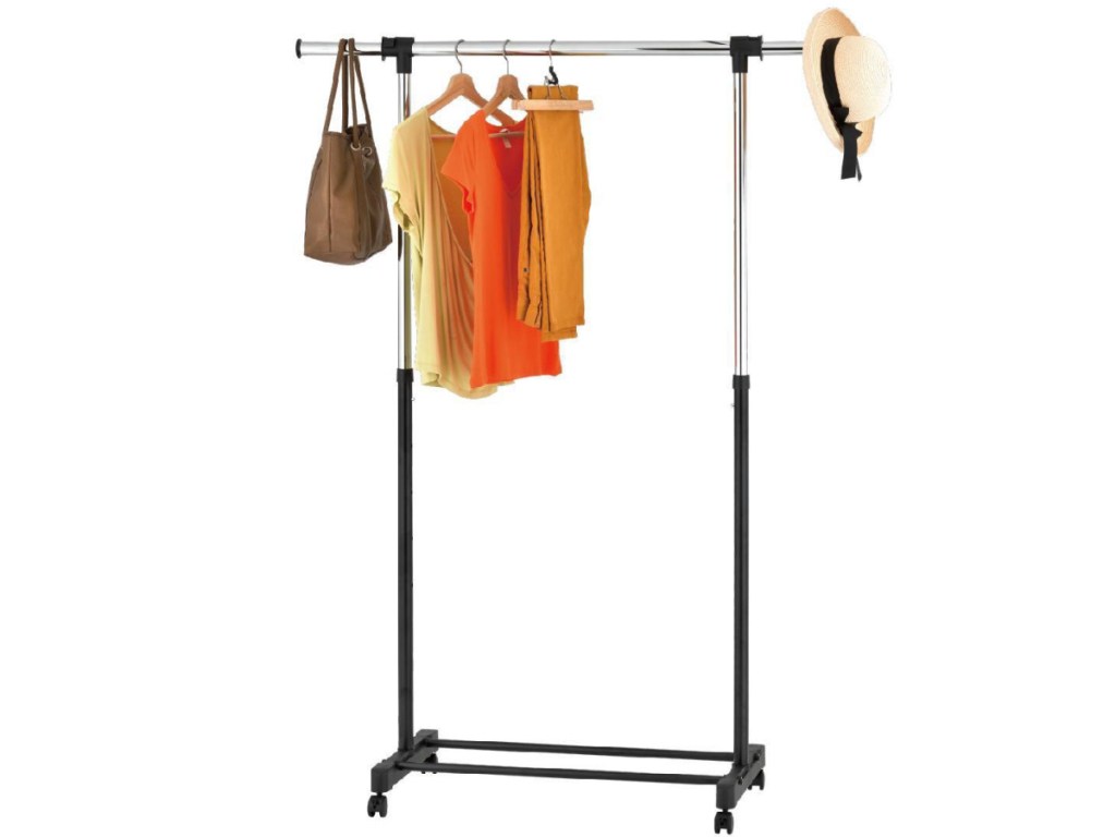 Room Essentials Adjustable Single Rod Garment Rack displayed with clothing and cats