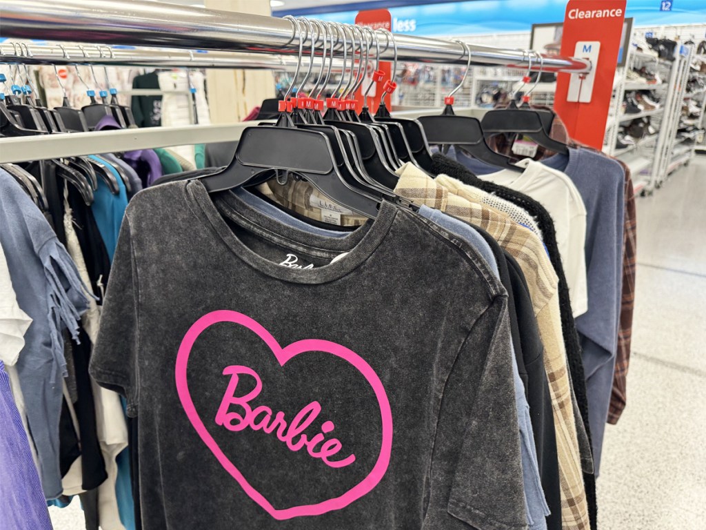 grey and pink barbie t-shirt on store clearance rack