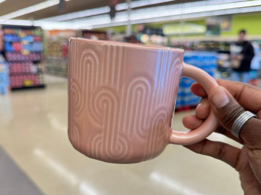 pastel pink curved Starbucks mug with retro design