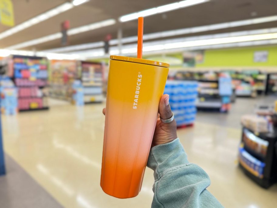hand holding a Gradient Orange Sherbet Cold Cup