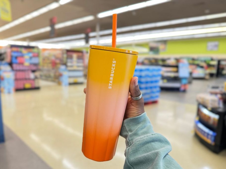 hand holding a Gradient Orange Sherbet Cold Cup 