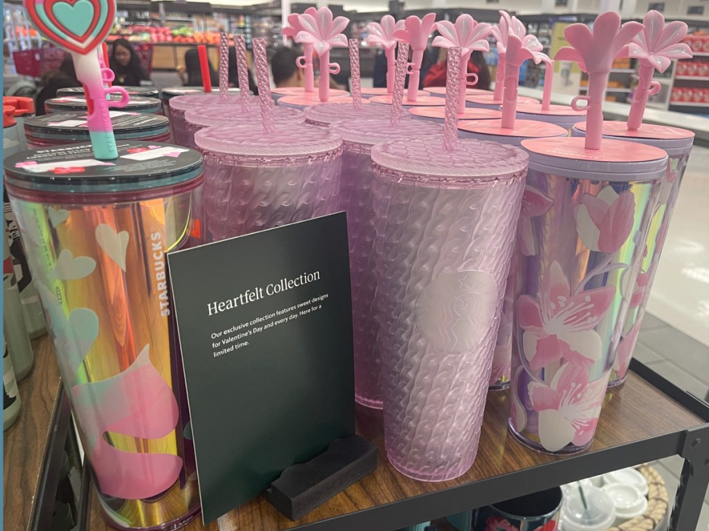 Starbucks cups displayed with a sign that says heartfelt collection