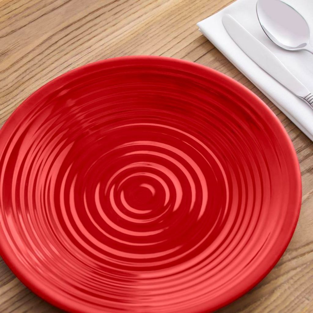 StyleWell Taryn Melamine Dinner Plate in Ribbed Chili Red in a place setting on a dinning table