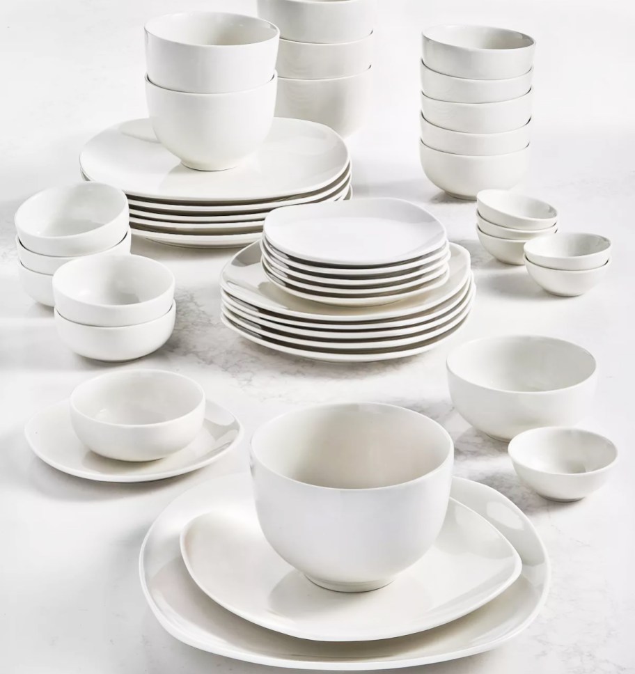 white dinnerware set stacked on table