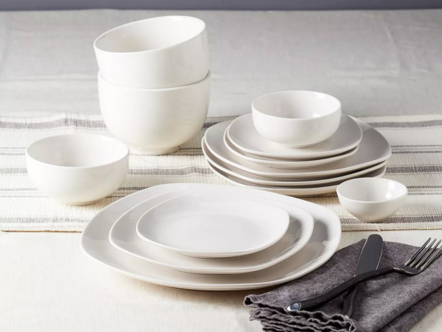 white dinnerware set stacked on table