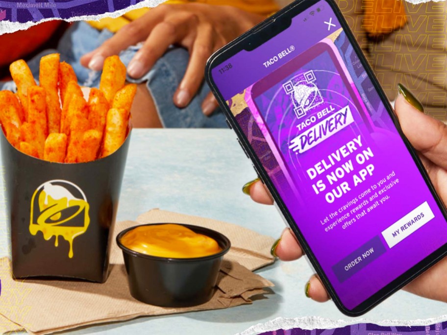 holding a phone with taco bell delivery on screen and nacho fries in background