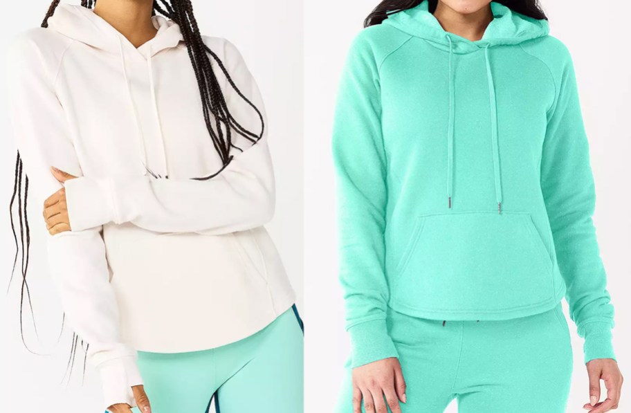 women in white and teal sweatshirts