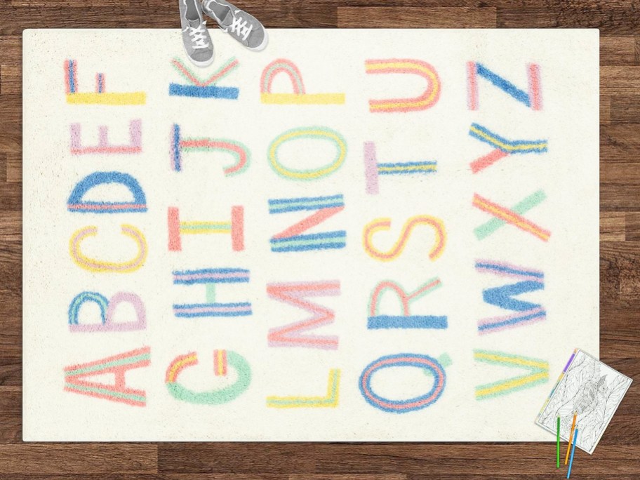 multi-color alphabet print area rug