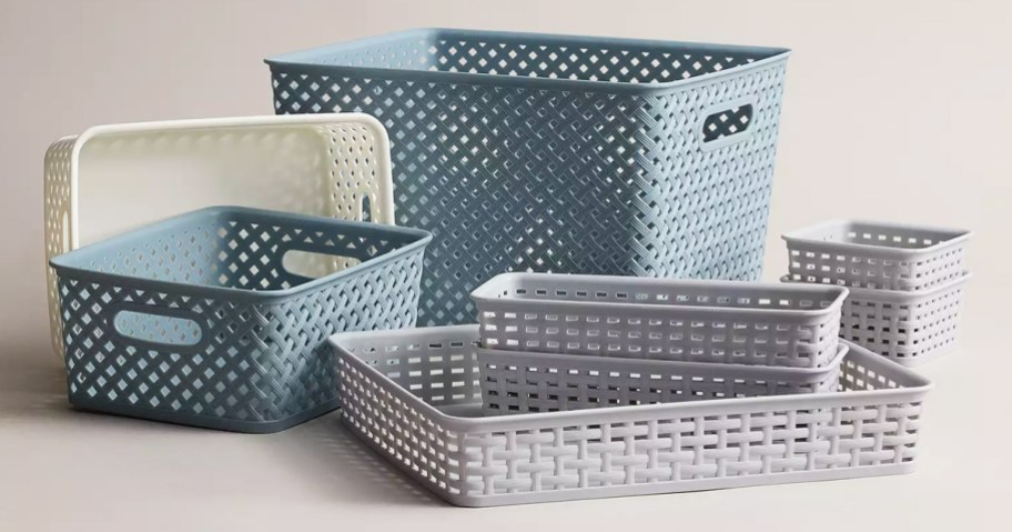plastic storage bins in various colors and sizes