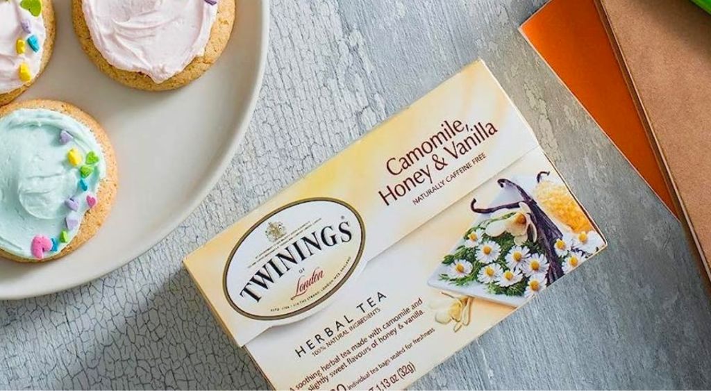 a Twinings Camomile & Honey Herbal Tea, bag next to a cup of tea