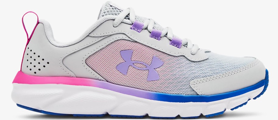 light grey, pink, purple, and blue under armour running shoe
