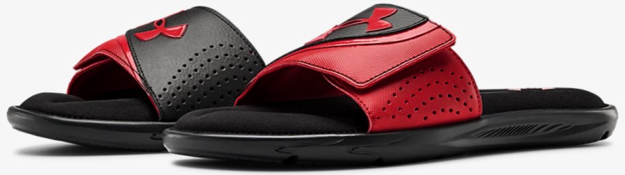 pair of black and red under armour slides