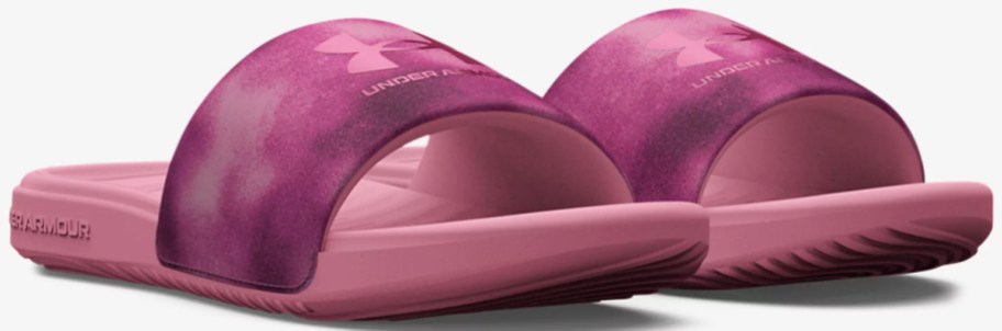 pair of pink under armour slides