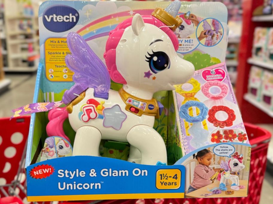 Vtech interactive toy unicorn sitting on cart in Target