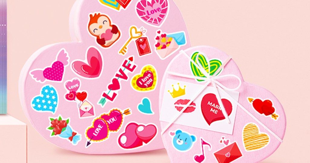 two pink hearts decorated with valentine's day stickers