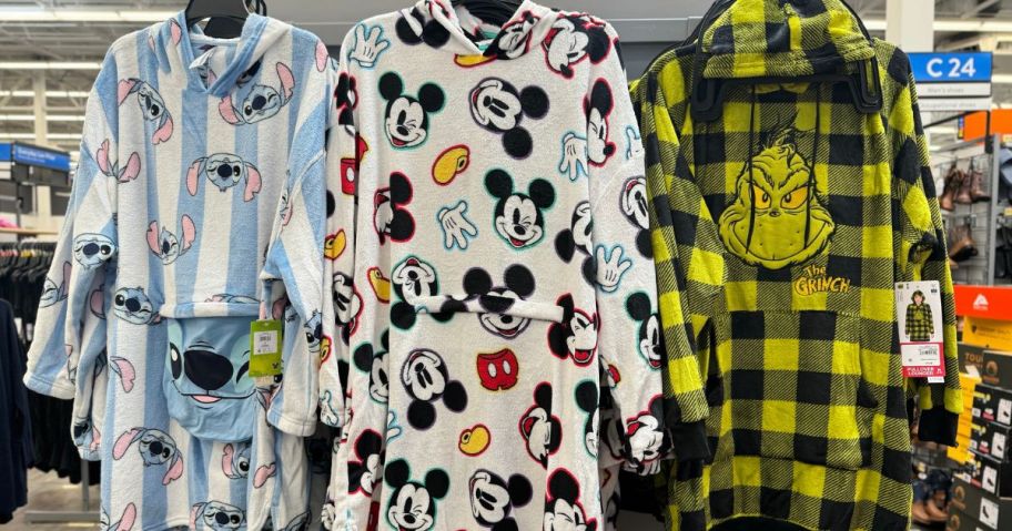 rack of licensed women's plush loungers at walmart with Stitch, Mickey Mouse and The Grinch designs