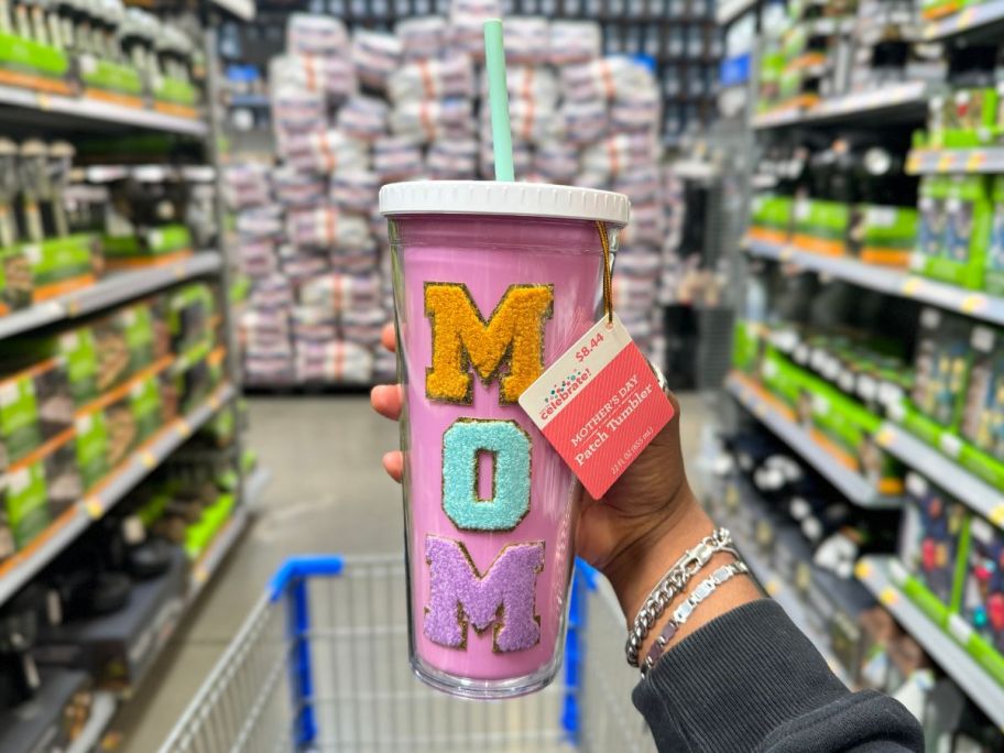 A hand holding a Way to Celebrate Mother's Day Tumbler Mom