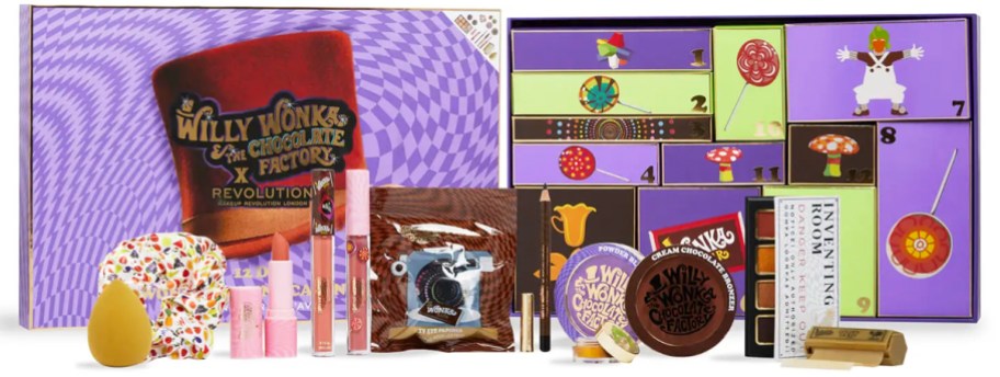 purple wonka advent calendar with makeup products in front of it