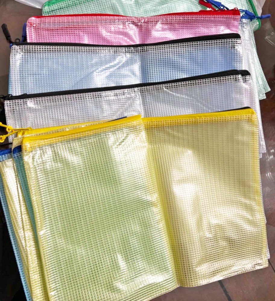 yellow, black, blue, red, and green mesh zippered pouches