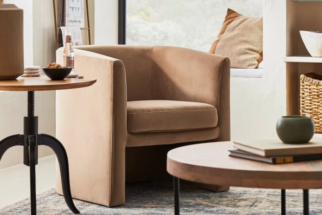 light brown velvet barrel accent chair in living room