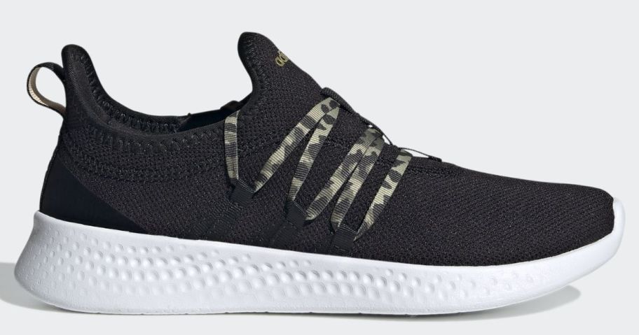 black and white women's Adidas running shoe with camo details