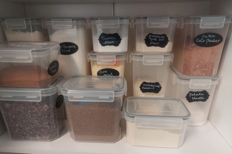 many airtight containers in pantry with dry goods