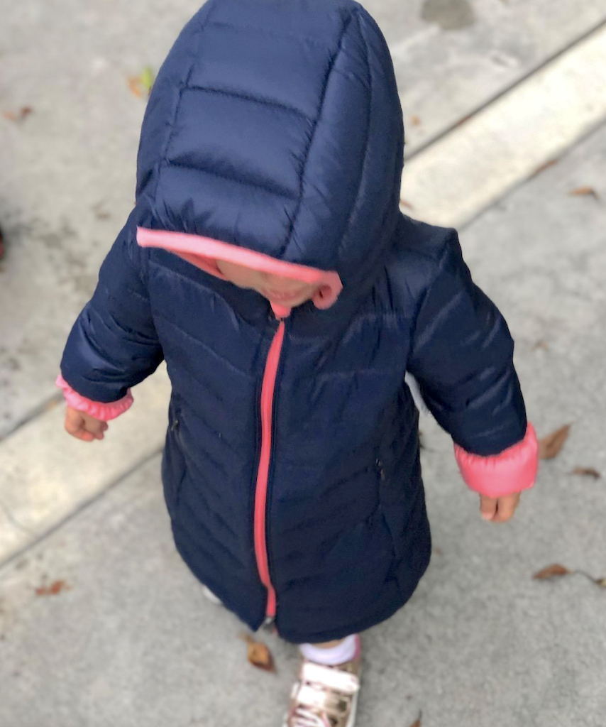 child wearing puffer jacket