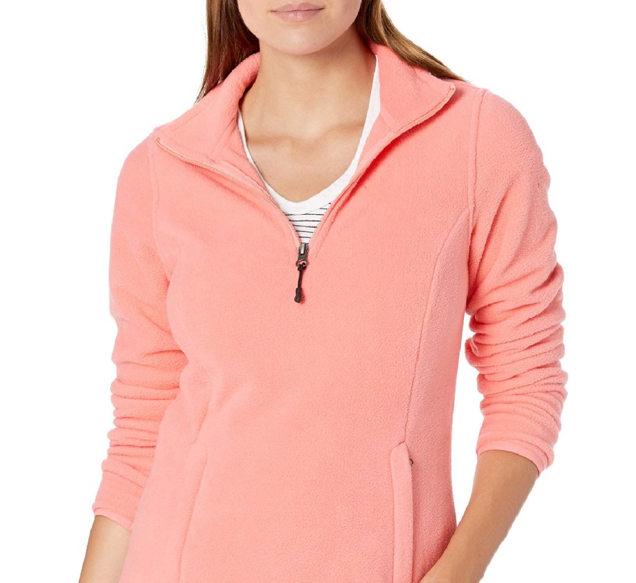 woman in peach fleece quarter zip pullover