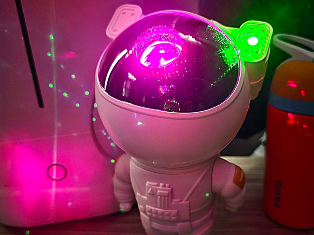 astronaut project with pink and green lights