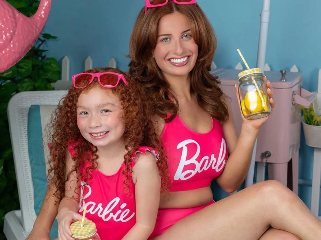 Mom and daughter wearing Mommy & Me Barbie bathing suits