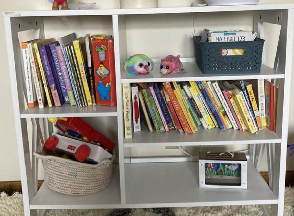 bookshelf from kohls displayed with books and toys