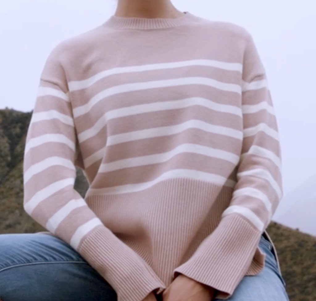 woman wearing brown and white striped sweater 