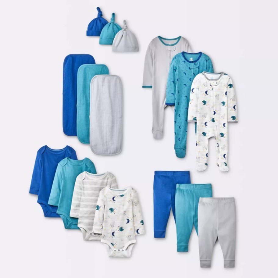 image of various baby boy's clothing items and burp clothes in blues, greys, teal green with nighttime designs