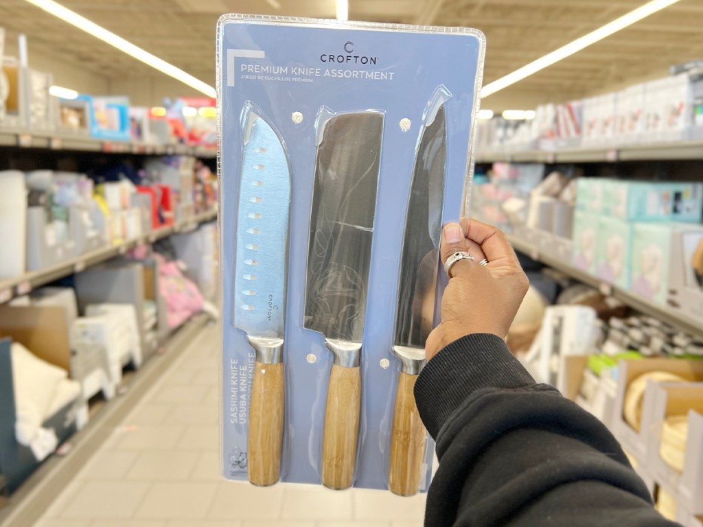 hand holding crofton knife set in aldi store