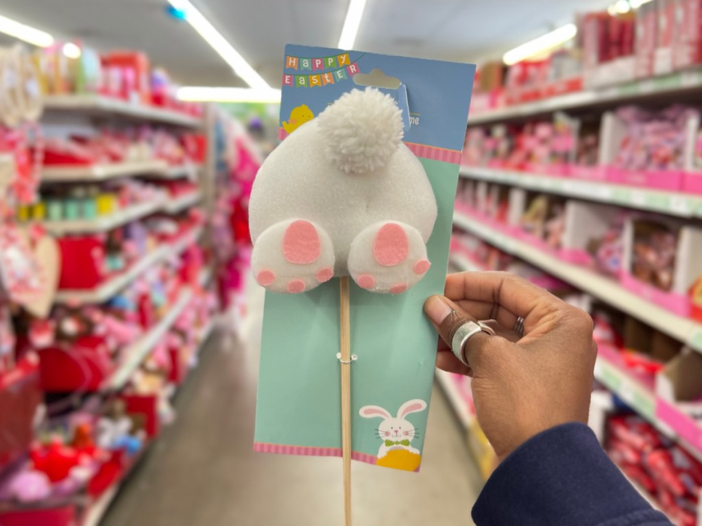 hand holding bunny tail pick in store