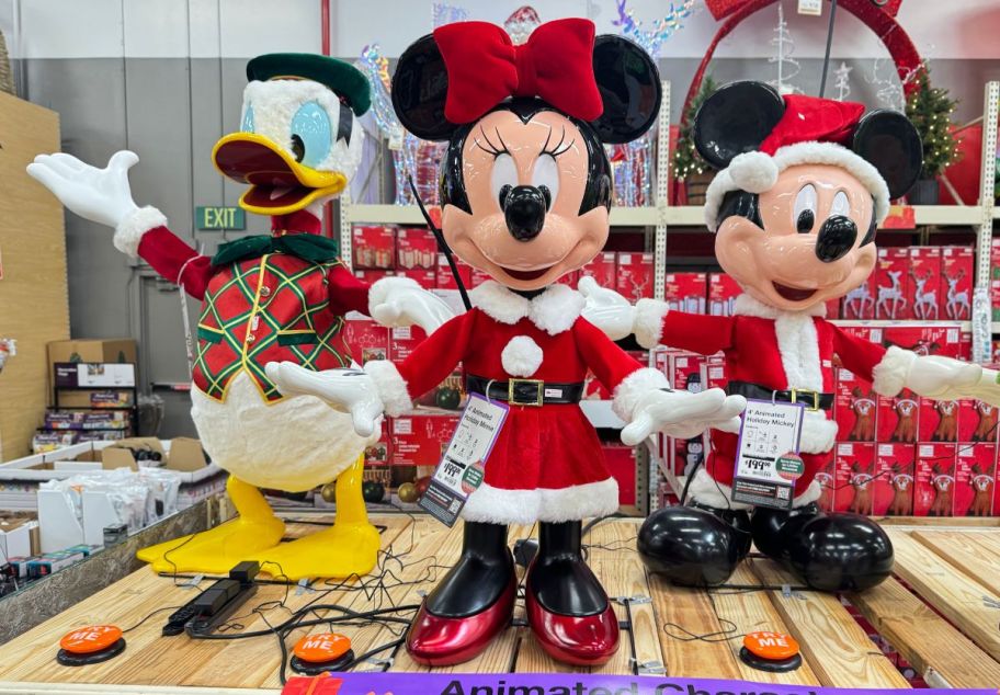 minnie and mickey holiday animatronics on display in a home depot