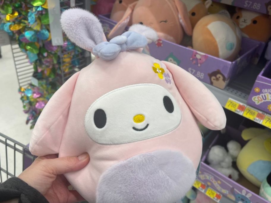 hand holding Squishmallows 8 Hello Kitty My Melody in a Bunny Suit in store