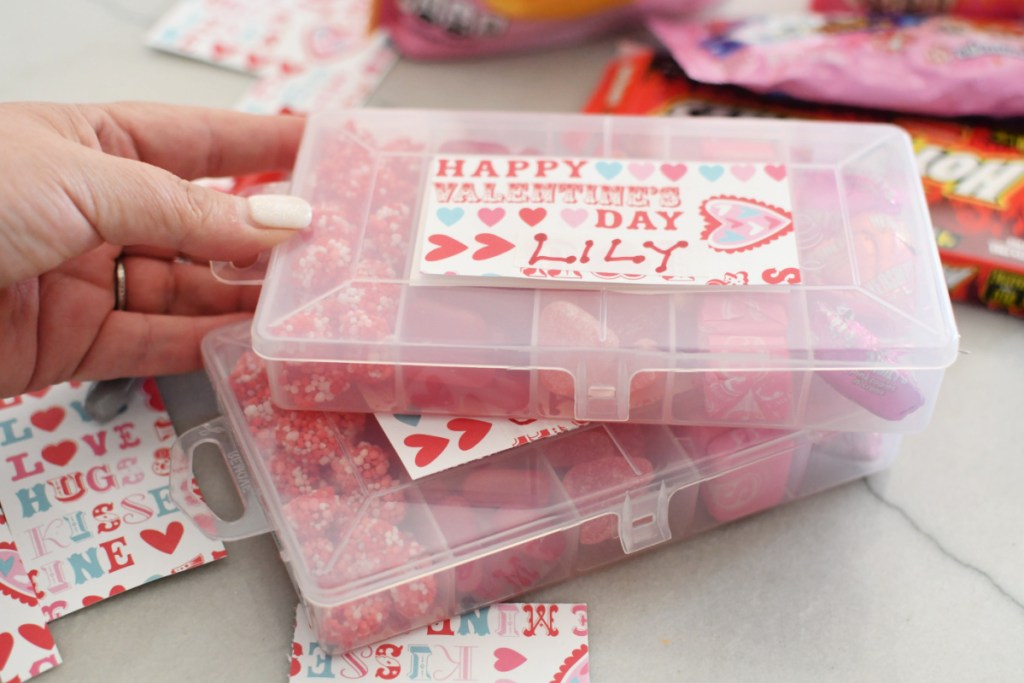 holding a valentines day tackle box