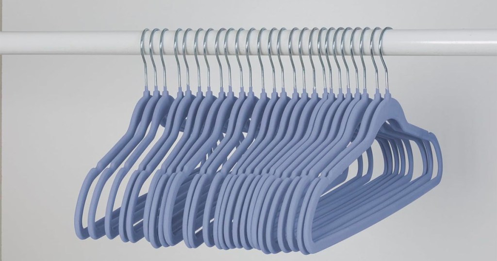 honey can do blue hangers hanging in closet