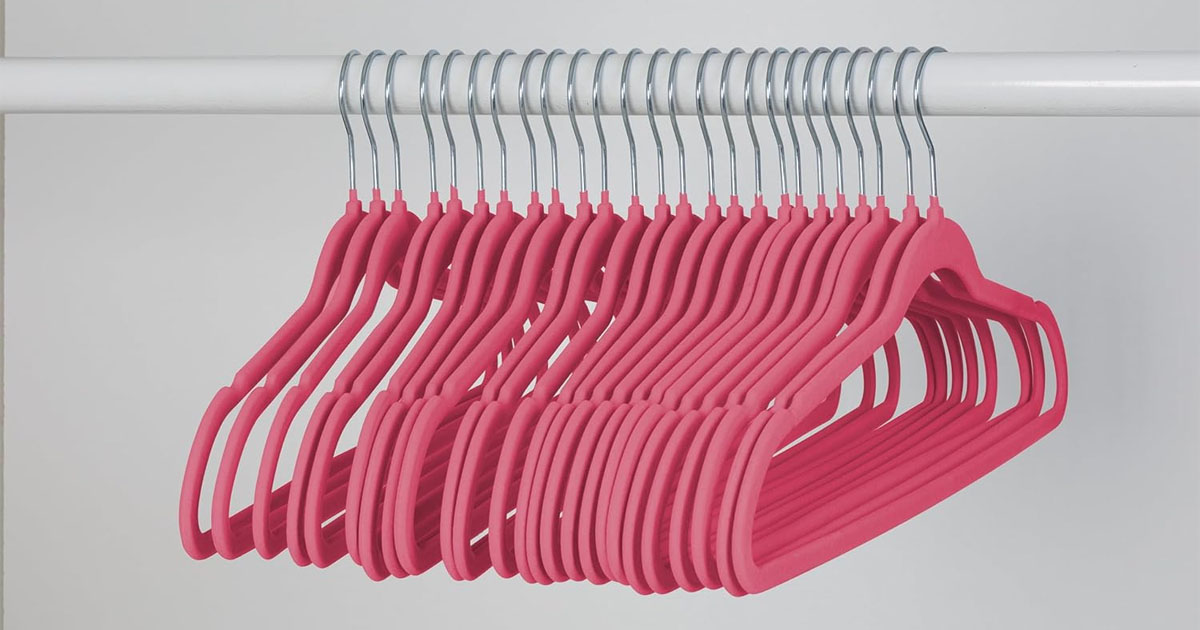 pink velvet honey can do hangers hanging in closet